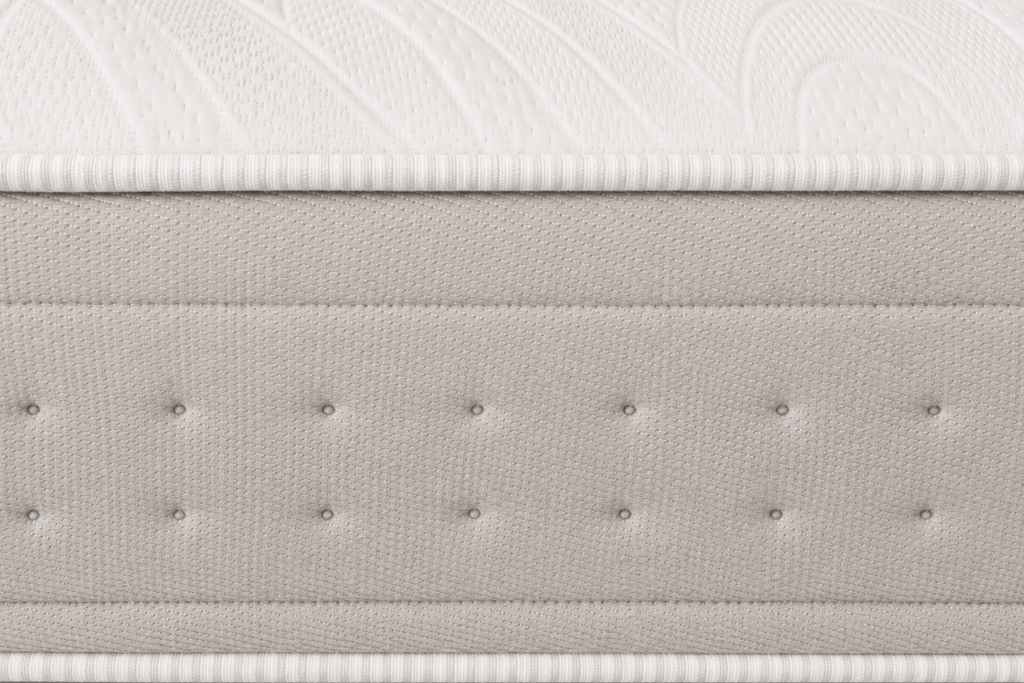 Detalle frontal de la platabanda beige acolchada del colchón Roma